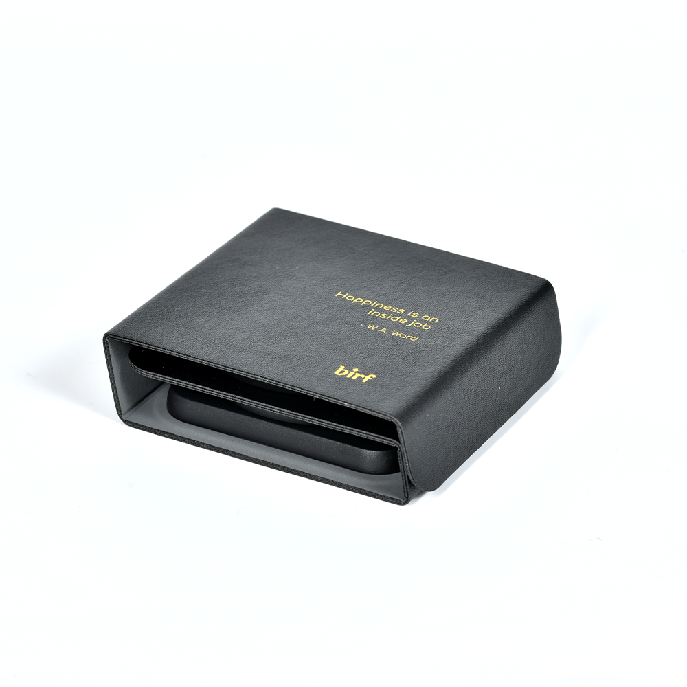 Sleek Birf 3-in-1 wireless charger for phone, smartwatch, and earbuds with compact design.