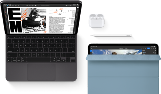 iPad Pro attached to Magic Keyboard, front exterior, space black colour, rounded corners, black display bezel, open, display showing article editing app with text and photograph of a woman playing music, Airpods 4 in open case, blue Smart Folio cover on iPad Pro with Apple Pencil Pro resting atop device, cover slightly open revealing display