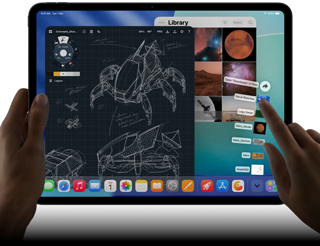 iPad Pro, space black colour, left hand holding device, right hand pointing gesturing to manipulate multiple open app windows, a drawing app with sketches of mechanical designs, photos library of planets and space images, downloads folder files fanned out