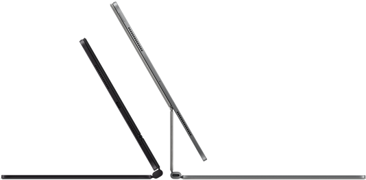 Two iPad Pro devices attached to Magic Keyboard, side exterior, thin profile, space black colour with speakers and USB-C port, tilted half open, silver colour, open, tilted back showing the keyboard’s floating cantilever design, speakers and microphone